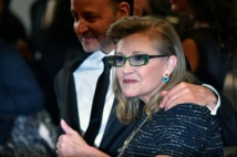 L'actrice américaine Carrie Fisher et le réalisateur Fisher Stevens L'actrice américaine Carrie Fisher et le réalisateur Fisher Stevens