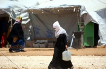 A Raqa, s'approvisionner en eau au péril de sa vie A Raqa, s'approvisionner en eau au péril de sa vie