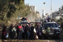 Syrie: nouvelles évacuations de civils assiégés à Homs Syrie: nouvelles évacuations de civils assiégés à Homs