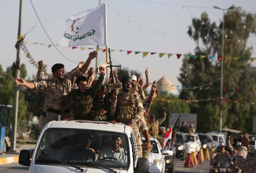 Irak: combats dans la ville de Tikrit, Kerry en Arabie Saoudite