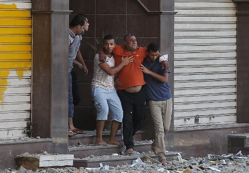 Israël prêt à "élargir" son offensive à Gaza, 265 Palestiniens tués