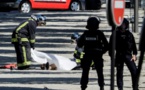 Attentat raté sur les Champs-Elysées: une fiche S, des armes et des questions