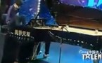 Chine: un pianiste manchot jouant avec les orteils star de la TV et du Net